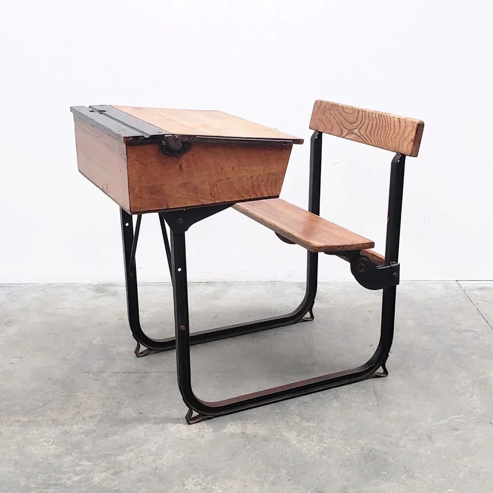 The Old Cinema (https://www.theoldcinema.co.uk/midcentury-school-desk-by-james-leonard-for-esavian-c-1950.html?srsltid=AfmBOoq3AyNBWHopAcgAZzWUaexPjFUFN2FPkoYu97Qv6SeAYLzt6LrO)